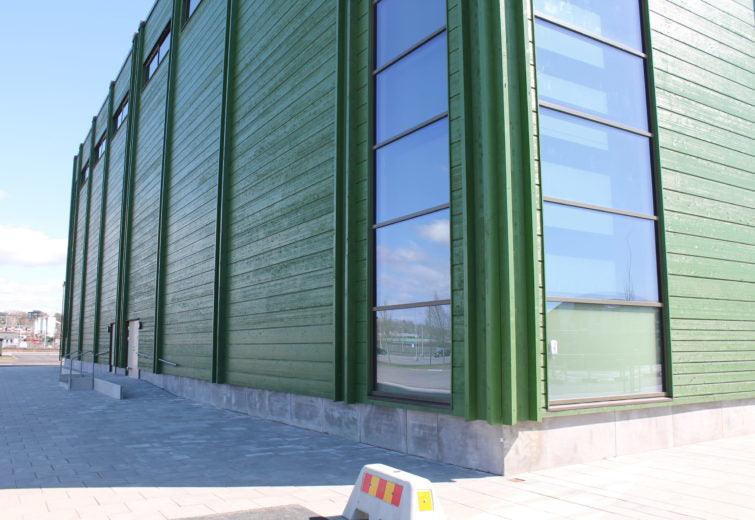 commercial building green pine tar siding