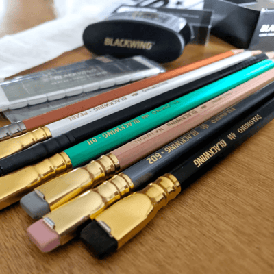 A bunch of Blackwing pencils and its pencil sharpener. | Craftsman Supply Co. 