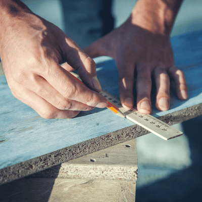 Marking & Measuring | Craftsman Supply Co. (Two hands holding a rule in place using a pencil to mark a measurement)