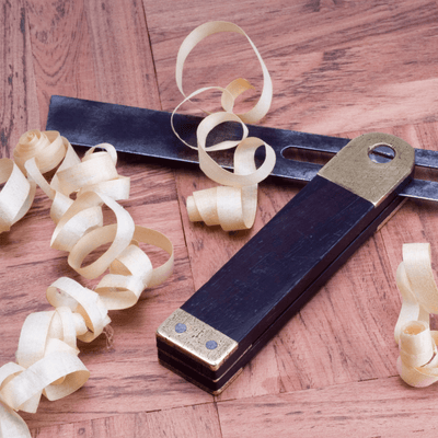 Squares and Bevels | Craftsman Supply Co. (Square and bevel sitting on a wood floor with wood shavings around it.)
