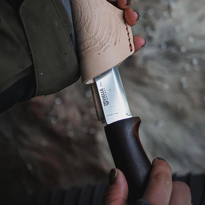 Helle Gro Knife being pulled out of sheath - Craftsman Supply Co