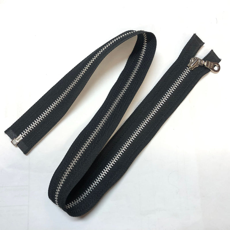 YKK 25" One-way Separating Aluminum Zipper with black backing.